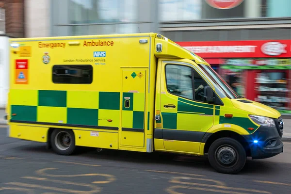 stock image London, UK - July 13, 2023: British ambulance in emergency on the streets of London.