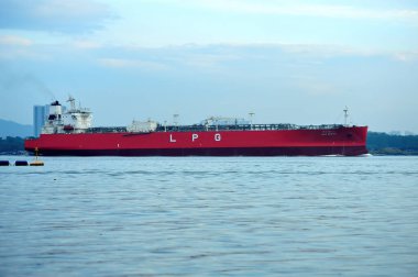 SINGAPORE - OCTOBER 23, 2022: Sea transportation of LPG ship in Johor Strait. It is located in Sembawang & close to Sembawang MRT (NS11) in northen Singapore. clipart