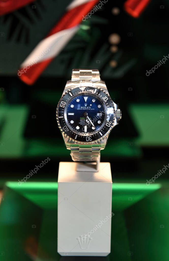 SINGAPORE - NOVEMBER 21, 2022: Close up of expensive Rolex watch. Rolex SA is a Swiss luxury watchmaker, founded in London, England in 1905.