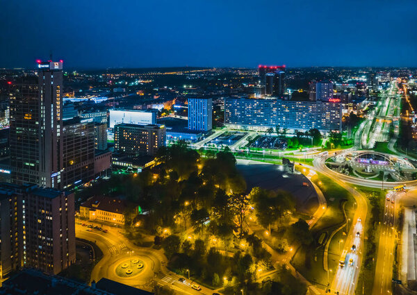 Katowice, May 8, 2022, Poland, Silesia. View of Katowice at night from a drone. View of the saucer in Katowice and the KTW building. Katowice city concept at night aerail view.