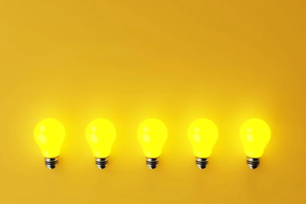 Plusieurs Ampoules Jaunes Éclairées Sur Fond Jaune Concept Formation Idées — Photo