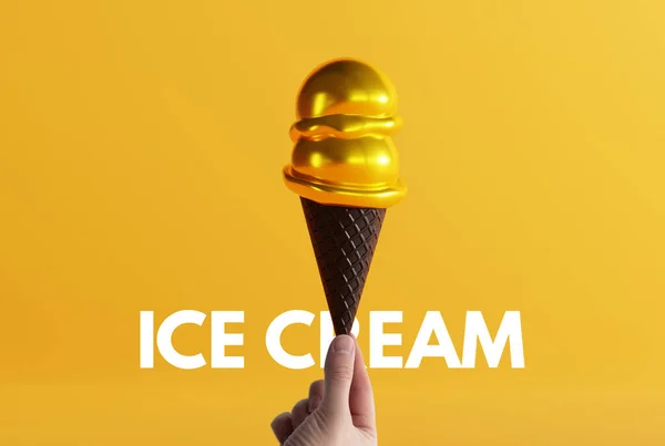 手は地面に黒いワッフルと黄色の背景に金のアイスクリームを保持しています アイスクリームを食べ 冷却するという概念 ブラックワッフル付きのモダンなアイスクリーム — ストック写真