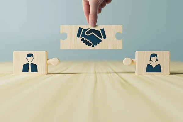 Hand Holds Wooden Wooden Blocks Icons Woman Man Shaking Hands — Stock Photo, Image