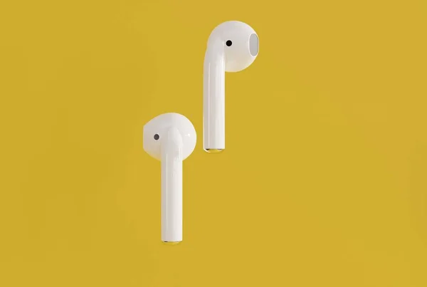 Wireless earbuds, earphones on a yellow background. Concept of listening to music, using wireless headphones. Modern headphones. 3D render, 3D illustration.