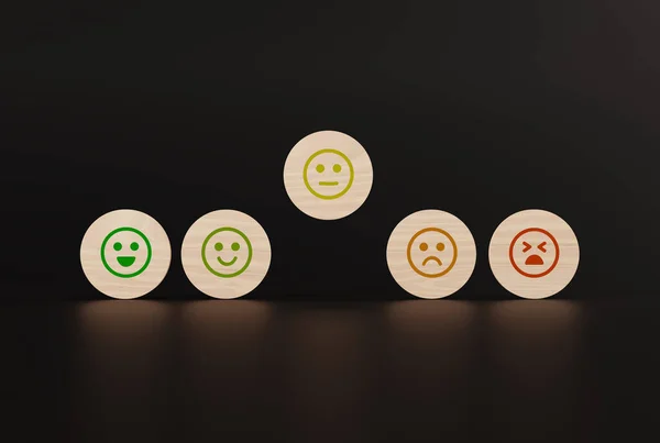 Wooden discs with icons of faces from happy to sad, a hand picks up a disc with an icon. The concept of evaluating, indicating the degree of satisfaction with the transaction. 3D render, 3D illustration.