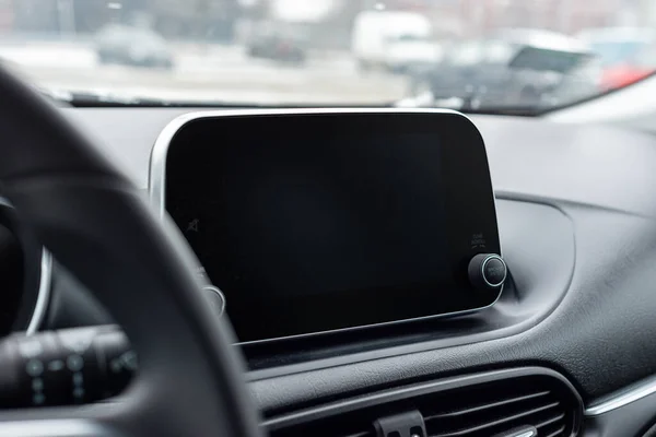 Automotive display in a modern car. The concept of using technology in the car.