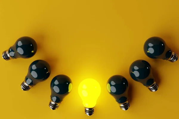 One lit Yellow light bulb in the background of other non-luminous light bulbs, yellow background. The concept of the formation of ideas, creativity, problem solving. 3d render, 3d illustration