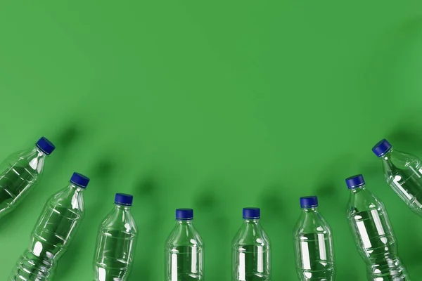 Plastic bottles on the background. The concept of recycling, reusing plastic. Save the Earth. 3d render, 3d illustration.