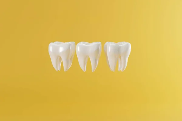 Teeth models on a pastel yellow background. Concept of caring for the teeth, checkup at the dentist. 3d render, illustration.