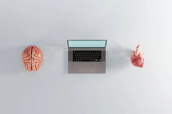 Brain and heart connected to a laptop. Concept of modern disease diagnosis, connectivity between organs and computer. Cyborg. 3d render.