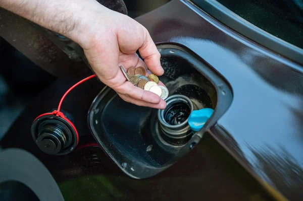 Hand Man Putting Coins Car Tank Close Expensive Fuel Concept — Foto de Stock