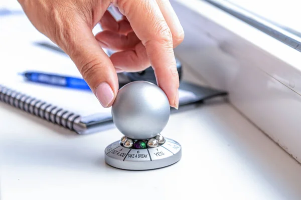 stock image hand spinning the wheel of opportunity, pointer on TAKE A BREAK, accidental luck concept.