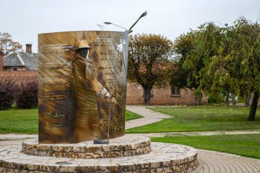 Bauska, Latvia - October 15, 2022:  Monument of the poet Vilis Pludonis in the city park