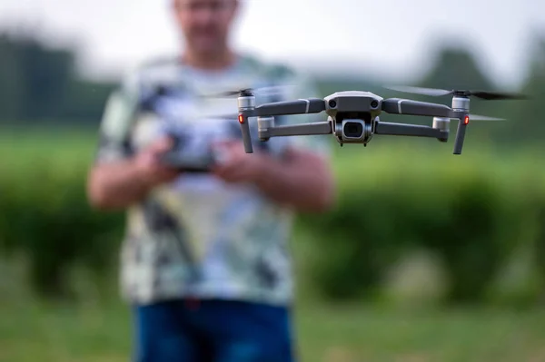 drone copter with digital camera flying in the air with blurred background