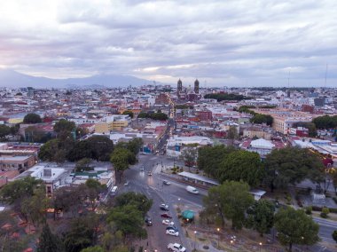 Puebla at Dramatic Evening Sunset aerial drone shot of City Center in Puebla de Zaragoza, Puebla State, Mexico. 4k