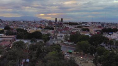 Puebla at Dramatic Evening Sunset aerial drone shot of City Center in Puebla de Zaragoza, Puebla State, Mexico. 4k