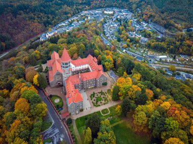 Aerial drone Shot of Abbey in Clervaux, Luxembourg in mystery evening twilight. 4k, 5k clipart