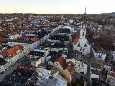 Bad Toelz, Aerial View of Famous old Ttown in Bavaria Germany. Bayern Bad Tolz in Winter sunrise. Mountains Isar river. High quality 4k footage clipart