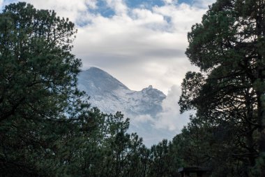 Close up magnification view on Volcano Popocatepetl from Iztaccihuatl, Mexico. High Quality photo clipart