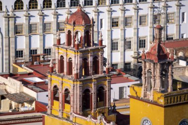 Guanajuato City, Mexico, aerial view of historical buildings. Close up of Templo de San Felipe Neri. Drone Shot. clipart