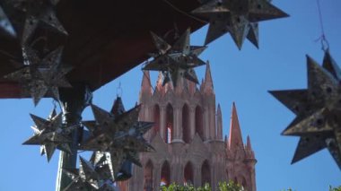 Smooth Gimbal Footage of great Parroquia de San Miguel Arcangel pink sandstone church in San Miguel de Allende, Mexico. High quality FullHD footage