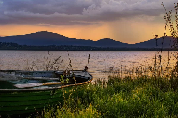 stock image Sunset at the lake with reflection in the water.