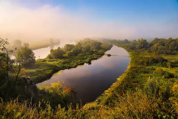 morning fog in the river, sunrise over the river, summer landscape.