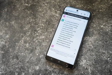 ChatGPT Open AI chat bot on phone screen. Will Chat GPT replace Google prompt response from AI chatbot. Swansea, UK - January 10, 2023.