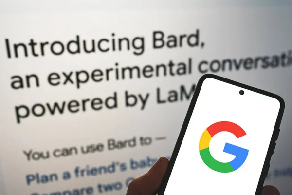 Google Launches Bard Google Logo Phone Hand Release Information Background — Stock Photo, Image