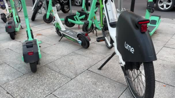 Lime Bike Bolt Electric Scooters Parked Sidewalk Shared Electric Vehicle — Stock Video