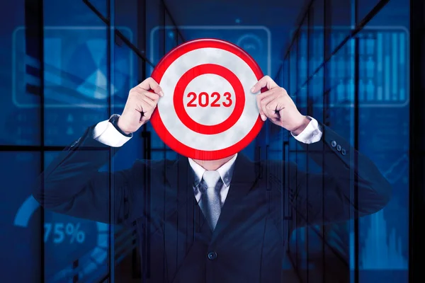 Unknown Businessman Covering His Face 2023 Numbers Dartboard While Standing — Stock Photo, Image