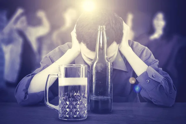Stressed Businessman Having Headache While Drinking Alcohol Dancing People Background — Stock Photo, Image