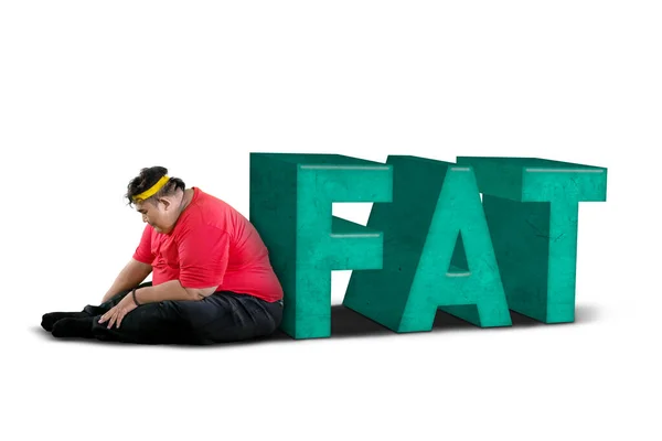Overweight Man Looks Sad While Sitting Fat Word Studio Isolated — Stock Photo, Image