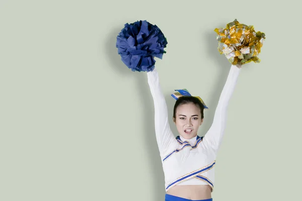 Una Cheerleader Femminile Azione Isolata Uno Sfondo Solido — Foto Stock