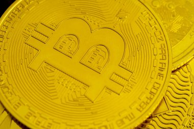 Bitcoin Bitcoin 'in makro ya da yakın plan fotoğrafı. Kripto para birimi Altın Bitcoin, BTC, Bit Coin