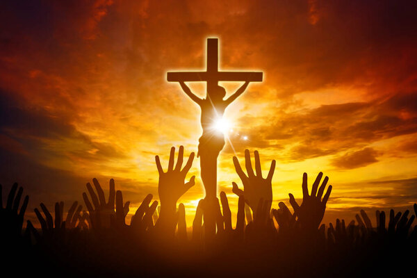 Christians raising their hands in praise and worship to Jesus Christ in cross. Repent Catholic Easter Lent Mind Pray