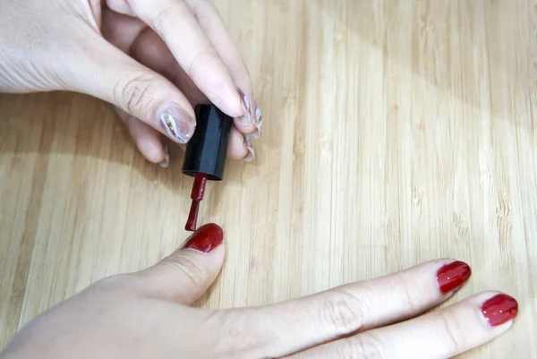 Closeup Shot Woman Doing Manicure Nail Paint Red Color — Stock Photo, Image