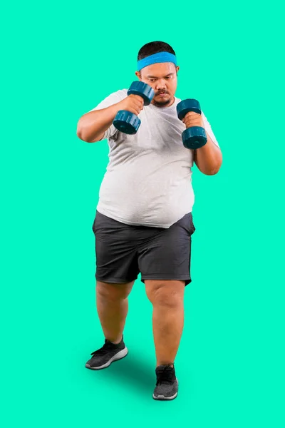 Overweight Asian Man Training Dumbbells Green Background — Stock Photo, Image