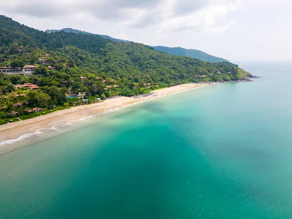 stock image Aerial drone view of bamboo bay and beach at Koh Lanta island, Thailand. Tropical forest near the rocky beach and white sand with turquoise water.