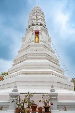 Wat Rakhang Kositaram buddhist temple at Bangkok, Thailand. White temple with pagoda, religion building.