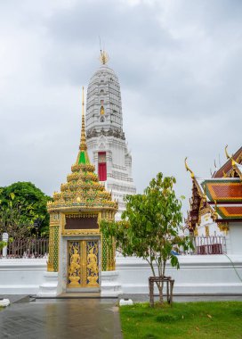 Wat Rakhang Kositaram buddhist temple at Bangkok, Thailand. White temple with pagoda, religion building.