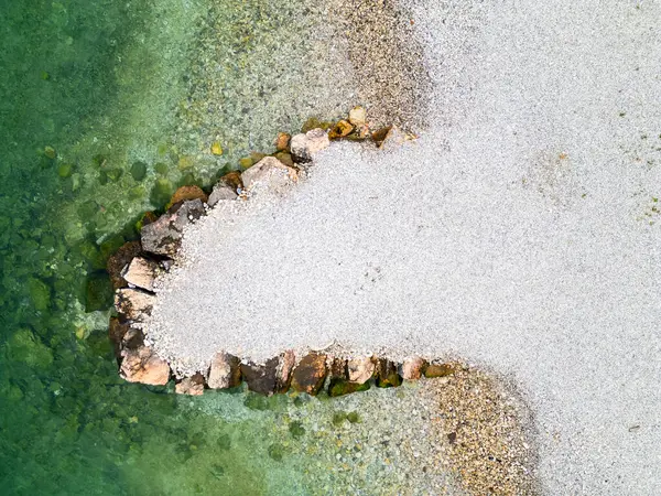 stock image Aerial drone view of Lago di Garda (lake Garda) coastline, Italy. The beach and fresh blue water.