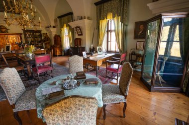 Cervena Lhota, Czech Republic - 28.10.2024: Interiors of the Cervena Lhota Castle , showcasing rooms, furniture, and historic furnishings that reflect the castle's rich history and charm clipart