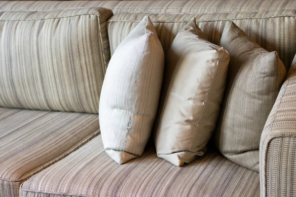 Sofa with pillows to lean back for relaxation;