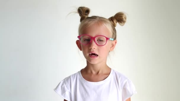 Close Portrait Little Girl Blonde Caucasian Milk Teeth Child Glasses — Stock Video