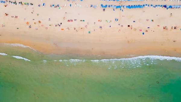 stock image Kata Beach, Phuket Island, Thailand,  the blue sea blue sky and white sandy beach during summer time of southern Thailand. This famous beach is good for holiday vacation and sun bathing.