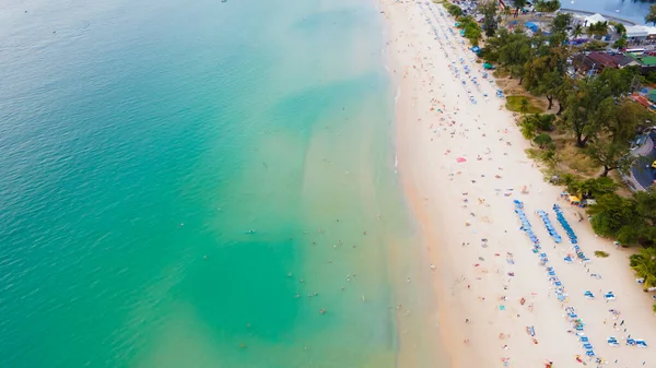 stock image Kata Beach, Phuket Island, Thailand,  the blue sea blue sky and white sandy beach during summer time of southern Thailand. This famous beach is good for holiday vacation and sun bathing.