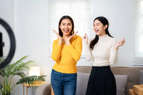 Two Women Smiling Dancing Living Room One Them Wearing Yellow Foto Stock Royalty Free