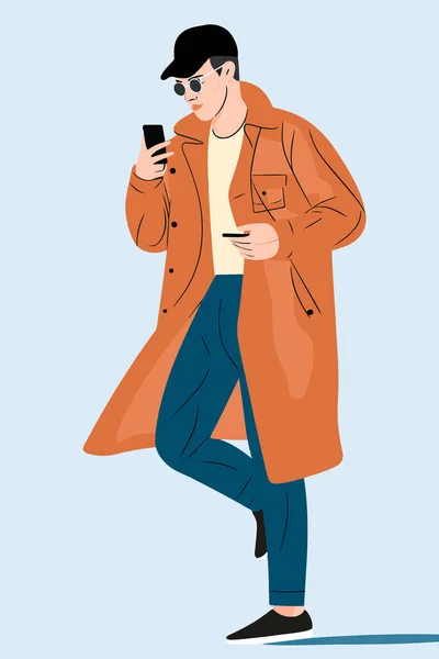 フラットスタイルベクター 彼の手で携帯電話でコートに若者のイラスト — ストックベクタ