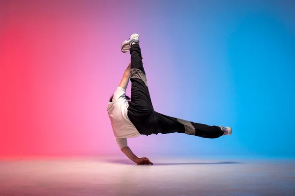 Dancer Doing Acrobatic Trick Dancing Breakdance Neon Red Blue Lighting — Stock Photo, Image